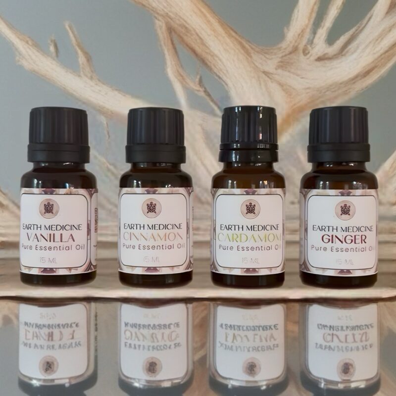 Vier flesjes essentiële olie – Vanilla, Cinnamon, Cardamom en Ginger – uit de Autumn Alchemy-collectie van Earth Medicine Market.